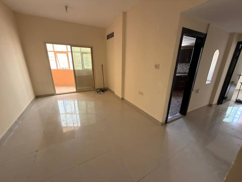 1 bedroom apartment _ Al Jurf 2 Ajman _ AED 27K _ 4 payments _ 1 bathroom _ balcony _ open view _ central AC _ maintenance included _ main road