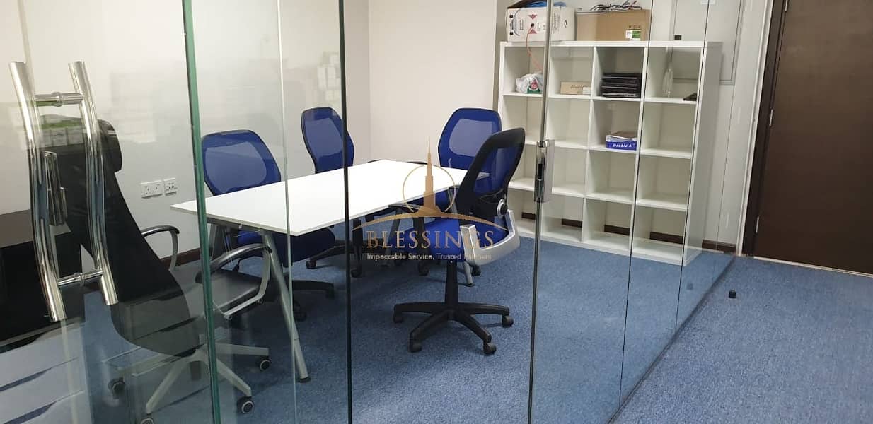 Furnished Office with Glass Partitions