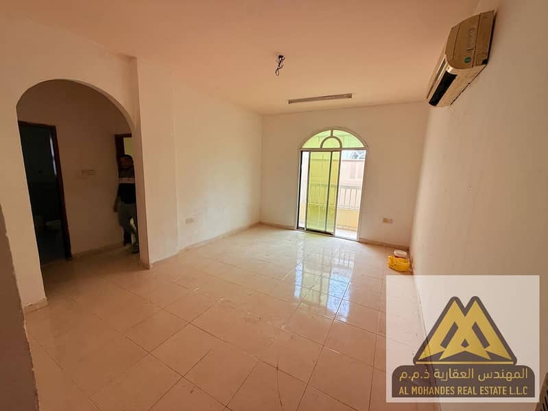 One Bedroom Apartment for Annual Rent in Al Rawda 3 Ajman – Spacious with Balcony and Split AC