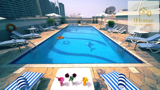 1 Slaapkamer Hotel Apartment te Huur in Bur Dubai, Dubai - POOL B. jpg 1 Slaapkamer Hotel Apartment te Huur in Bur Dubai, Dubai - POOL B. jpg