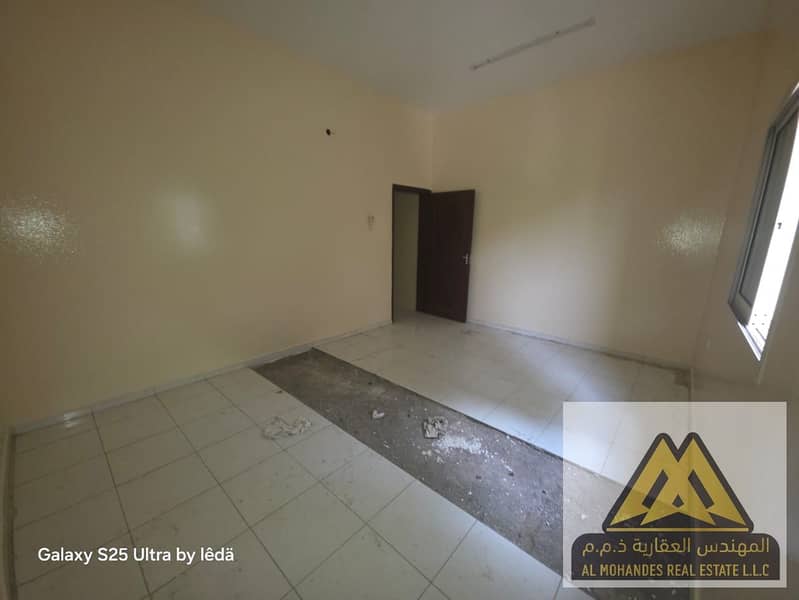 One-Bedroom Apartment for Annual Rent in Al Rawda 2 Ajman – Affordable Unit without AC and Elevator
