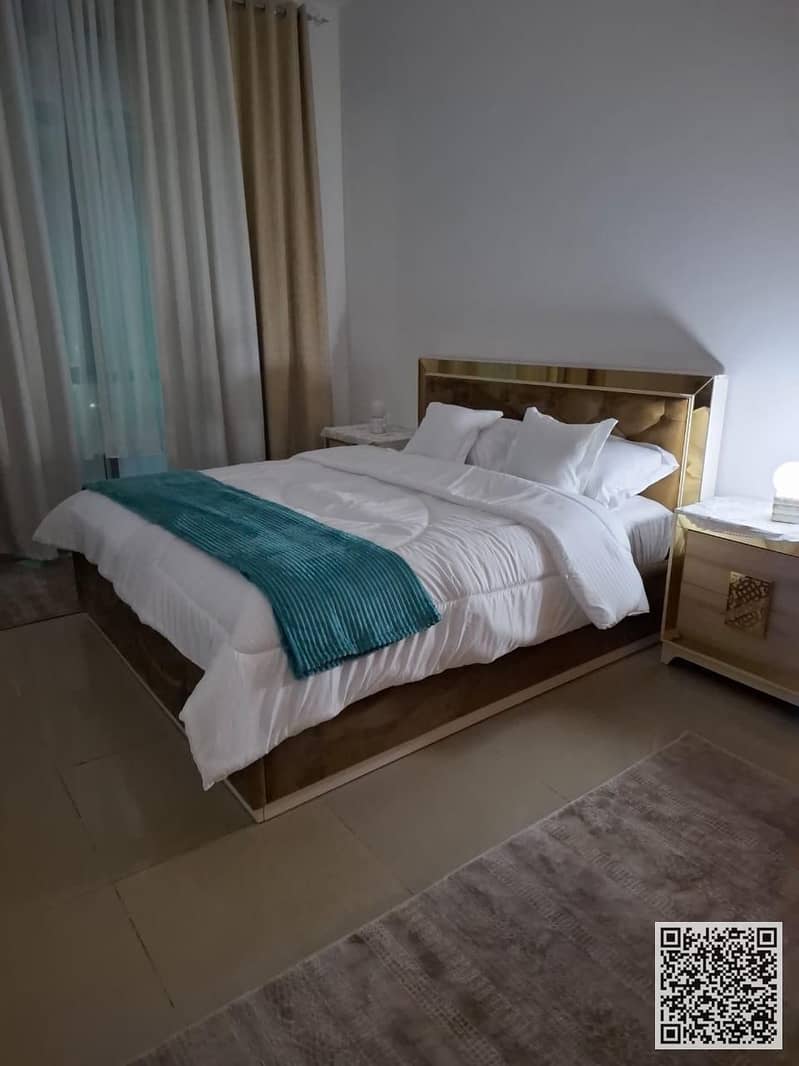 For monthly rent: Luxurious furnished one-bedroom apartment with a living room, in Ajman Corniche. Includes all bills and internet.