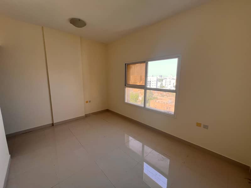 Studio apartment for rent with separate kitchen, central air conditioning, spacious layout, and prime location behind Al Safir in Al Nuaimiya 3.