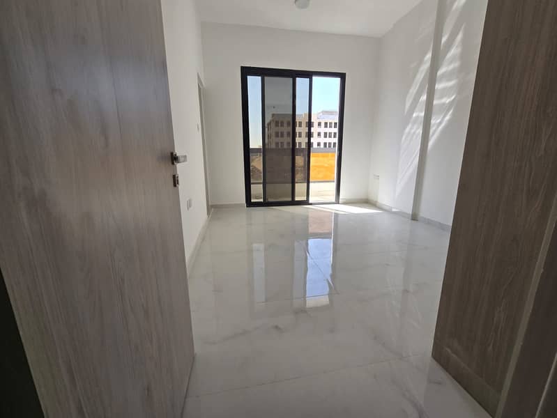 One bedroom and living room apartment for annual rent in Ajman 33,000 AED payable in 4 installments First occupancy, spacious, high-end finishes 2 ba