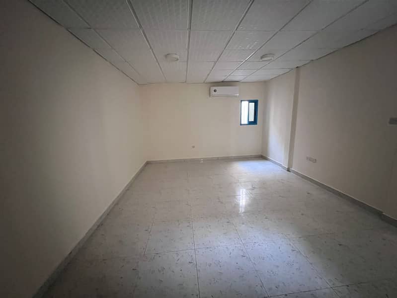 A one-bedroom apartment with a living room is available for annual rent in Al Nuaimiya, strategically located next to Al Hikma School