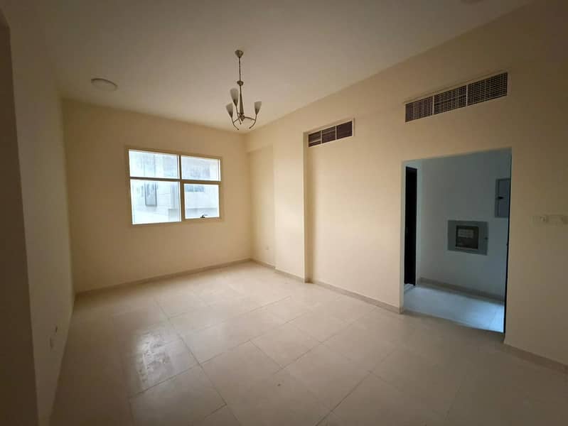 For annual rent: A two-bedroom apartment with a living room in Al Jurf 1, Ajman. Located in a prime location near schools and adjacent to Sheikh Ammar