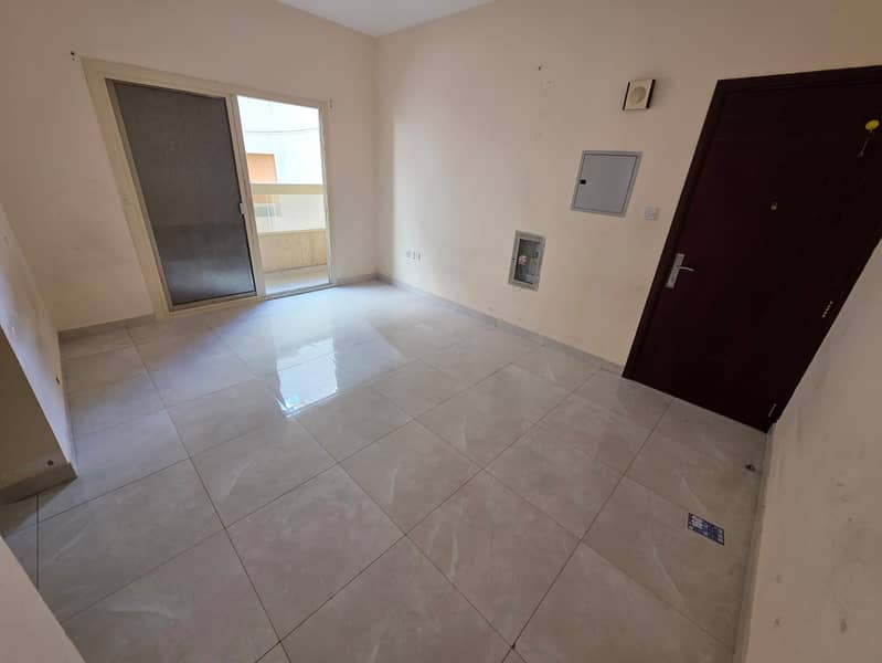 For annual rent: A one-bedroom apartment in Al Jurf 2, Ajman, strategically located on Sheikh Ammar Street and directly on the main road,
