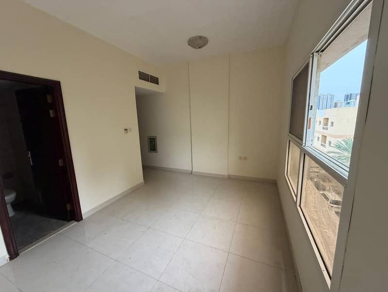 studio _ Al Nuaimiya 3 Ajman _ AED 22K _ 4 payments _ separate kitchen _ central AC _ spacious _ behind Al Safeer _ prime location