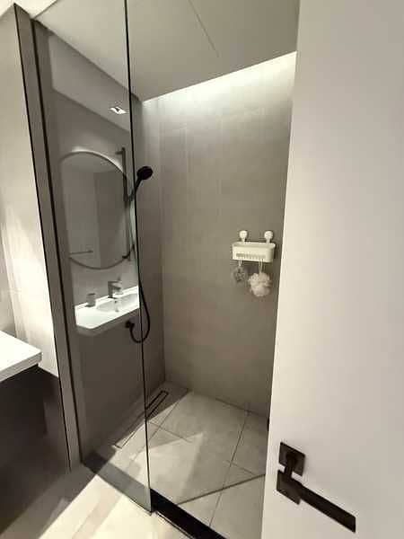 9 15 Northside Studio Bathroom Shower. jpg