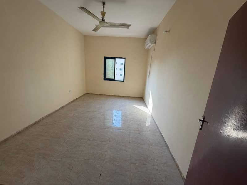 2 bedroom apartment _ Ajman Corniche _ AED 35K _ 6 payments _ 2 bathrooms _ balcony _ separate living room _ open view _ second row