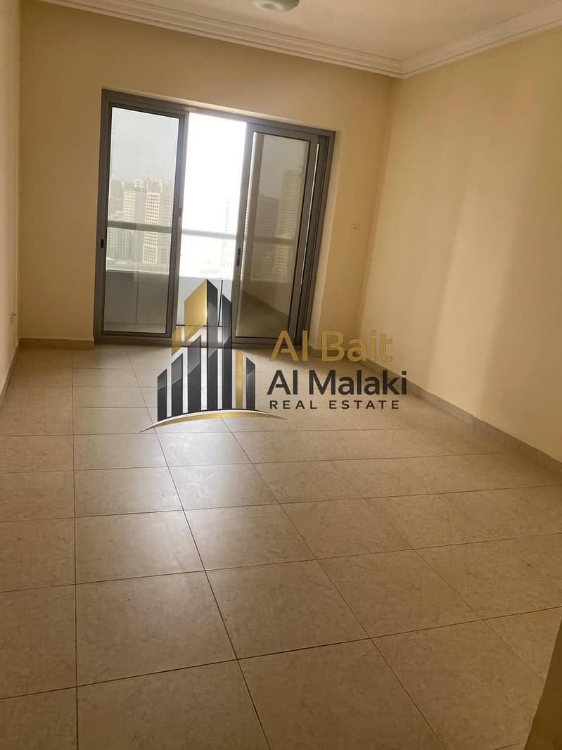 one bedrooms and a living room in Al Al al Taawun with a balcony and open view