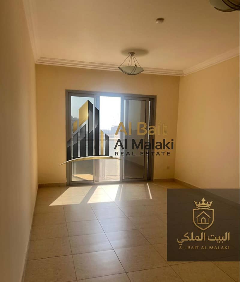 Tow bedrooms and a living room in Al Al Al Taawun with a balcony and open view