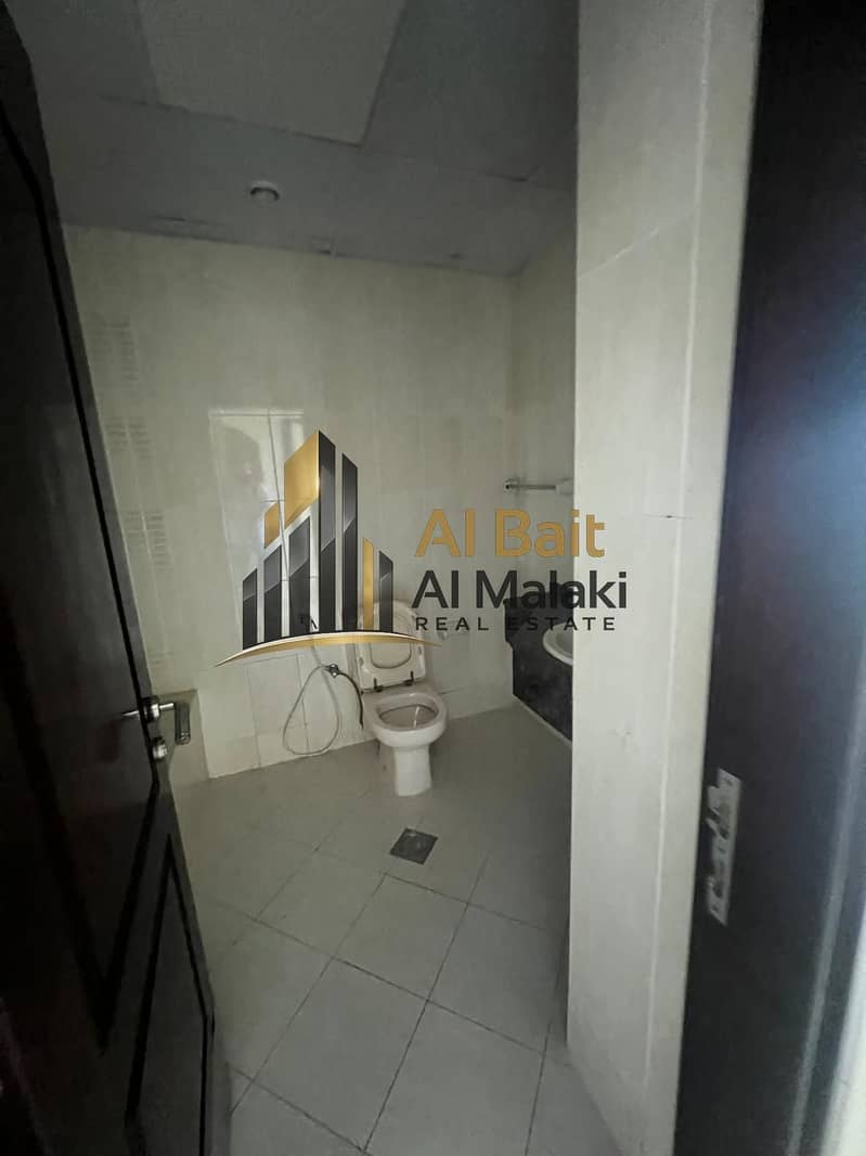 Tow bedrooms and a living room in Al Al Taawen with a balcony and open view