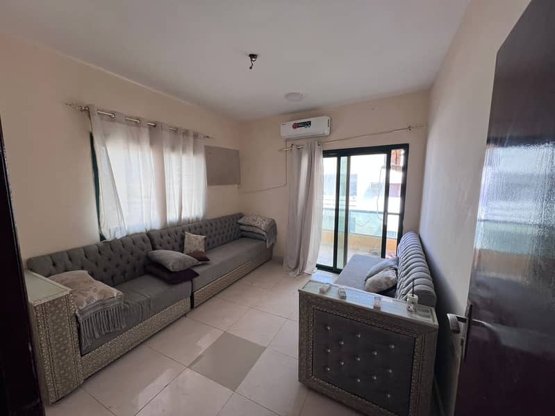 Two bedrooms and a living room # Central air conditioning # Free maintenance # Corniche # Ajman