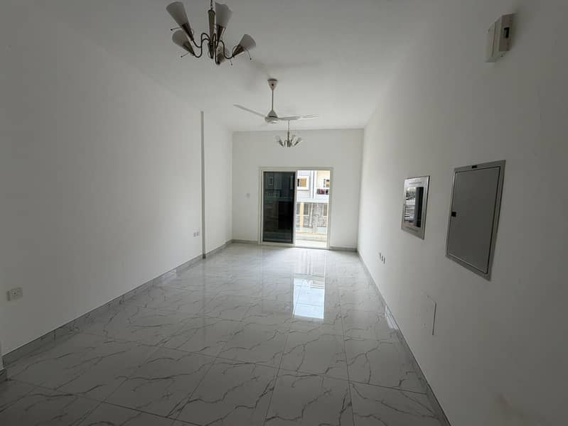 Two bedrooms, living room, two bathrooms, balcony, central air conditioning, brand new, second occupant, in Al Muwaihat 3