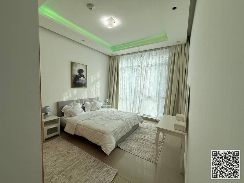 Luxury apartment for monthly rent, one bedroom and a hall with an sea view, fully furnished with elegant furniture and a fully equipped kitchen