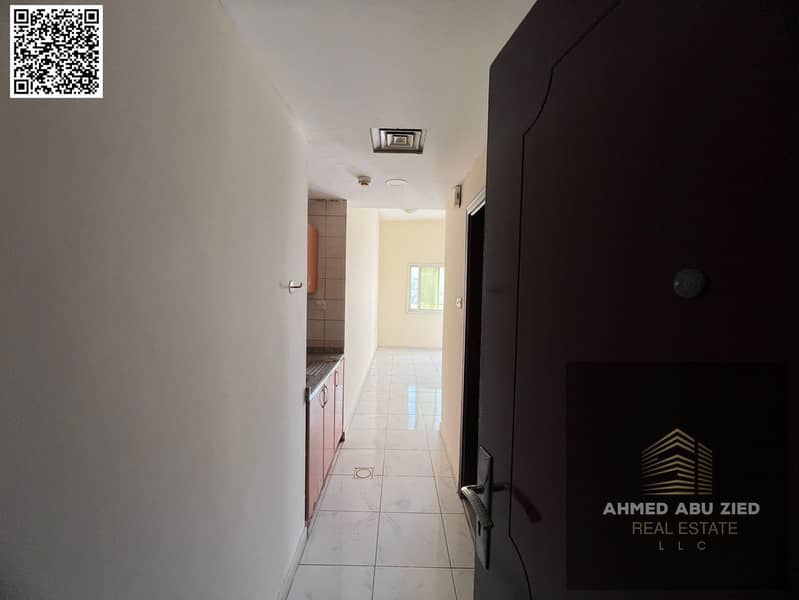 Studio apartment for annual rent in Al Nuaimiya 1, Ajman. Prime location near Kuwait Street, close to all services. Flexible payment options.