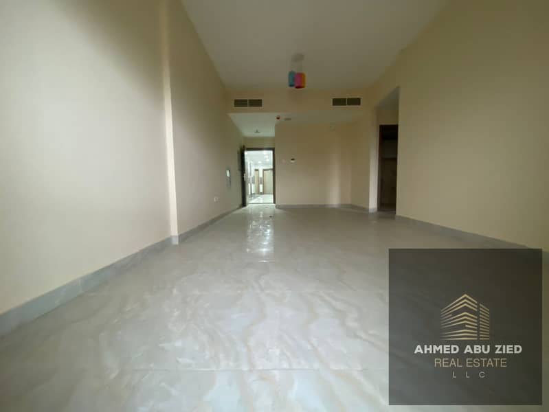 One bedroom and living room for annual rent in Al Jurf 3, Ajman. Brand new building, first occupancy. Central air conditioning, balcony with open view