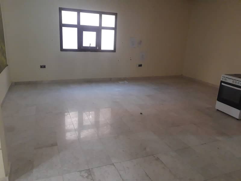 Spacious flat 2 bedroom   hall for rent in Mohammed Bin Zayed City good location(near market)