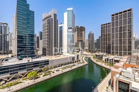 2 Bedroom Flat for Rent in Business Bay, Dubai - Stunning Canal Views | Maids Room | Brand New 2 Bedroom Flat for Rent in Business Bay, Dubai - Stunning Canal Views | Maids Room | Brand New