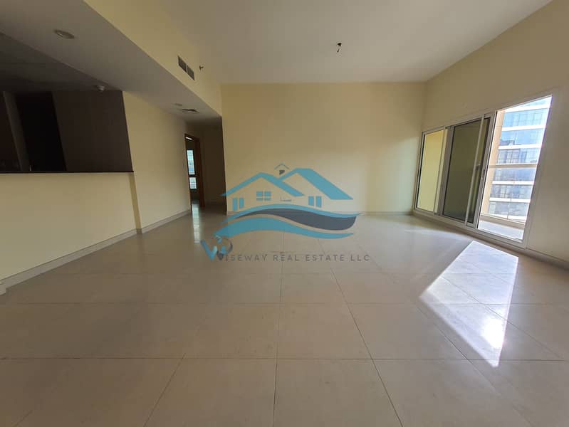 Spacious 2BR with Balcony | Prime Location | Laundry Space
