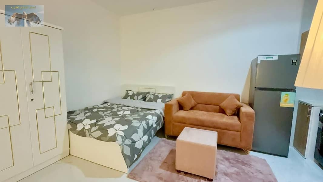 Lowest price furnished studio, first occupancy, prime location, easy access to Sharjah and Dubai, close to all services
