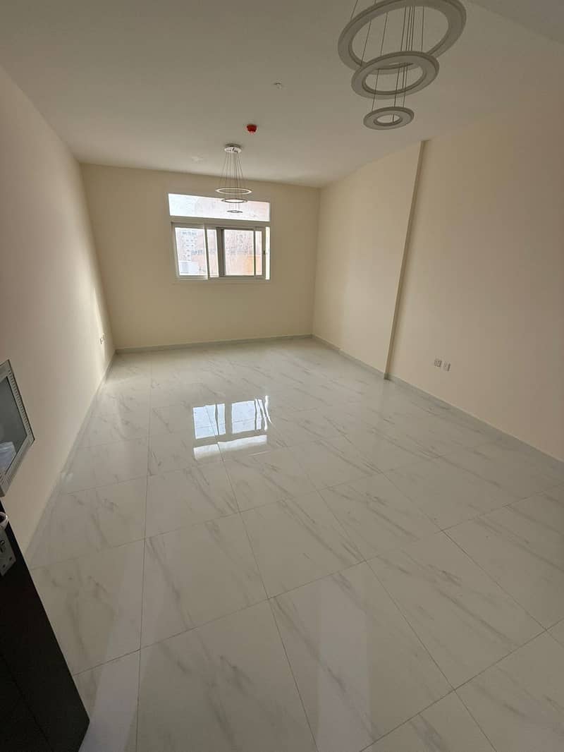 Cheapest two-bedroom apartment with a living room in Al-Jarf 3, second occupancy, prime location, top-of-the-line finishes, central air conditioning