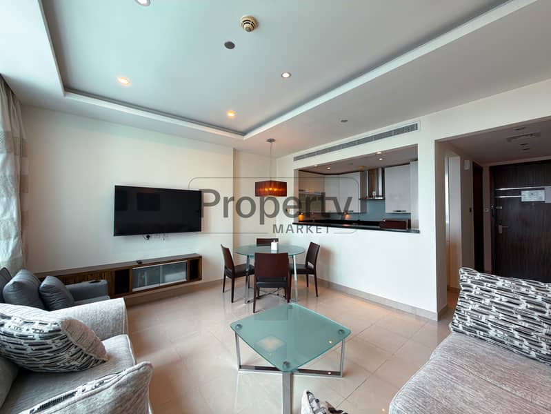 Furnished | High Floor | Balcony | Prime Location
