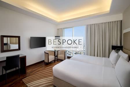 شقة 1 غرفة نوم للايجار في الصفوح، دبي - Deluxe Room_Twin Bedroom. jpg