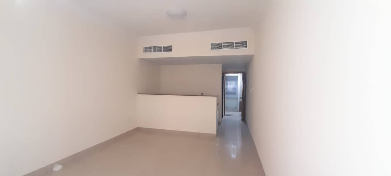 Spacious studio apartment in muwaillah sapraite kitchen