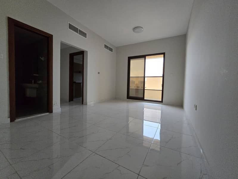 1BR + living + master in Al Rawda 1, new building, 2 baths, balcony, built-in wardrobes, AED 32k/6 payments, AED 2,000 deposit.