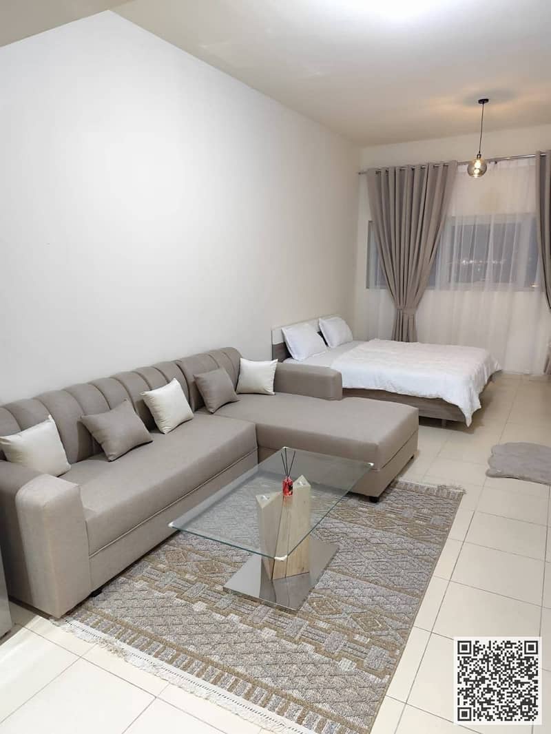Furnished studio apartment for monthly rent in Ajman One Tower, Al Rashidiya 3 Includes bills, internet & parking Ready to move in immediately!