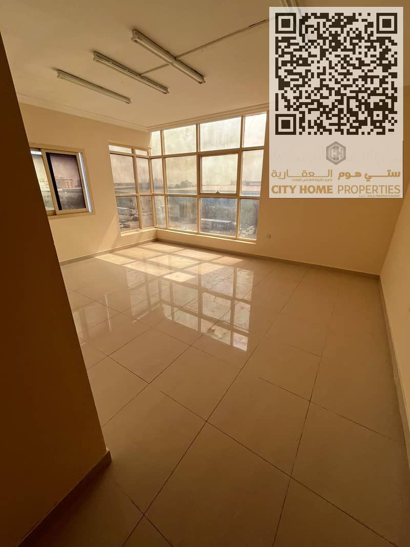 Annual apartment for rent in Al Jurf 2, Ajman with a large space and clean finishing Central AC + built-in wardrobes + prime location near Al Aqsa Sch