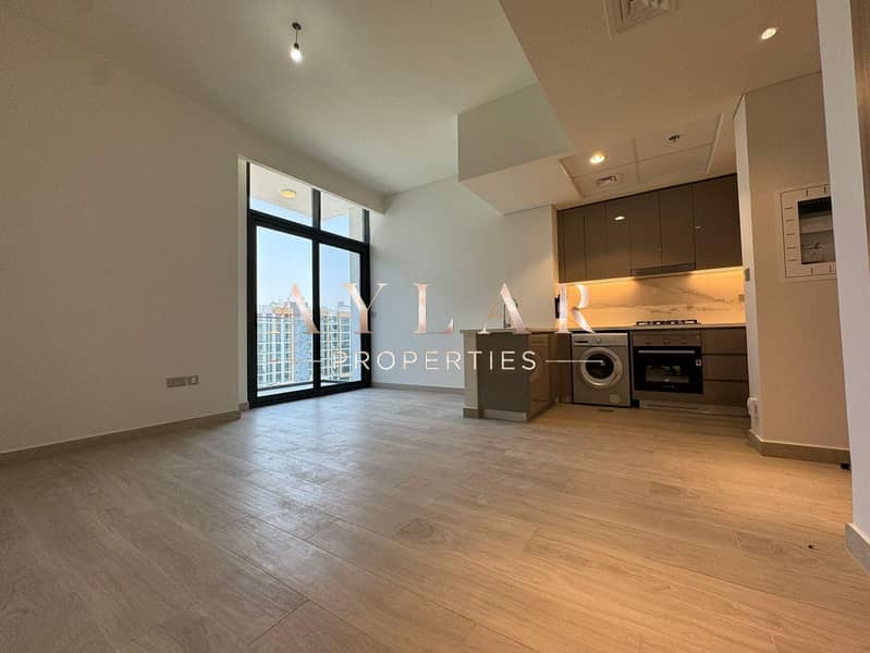 Bright & Modern 1BR in Azizi Riviera 45