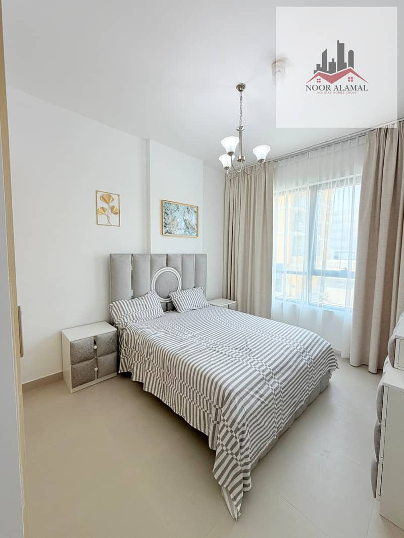 Dubai Silicon Residence 2. . . One bedroom, living room, fully equipped kitchen, two bathrooms, and a balcony. Furnished with hotel-style furniture. Pri