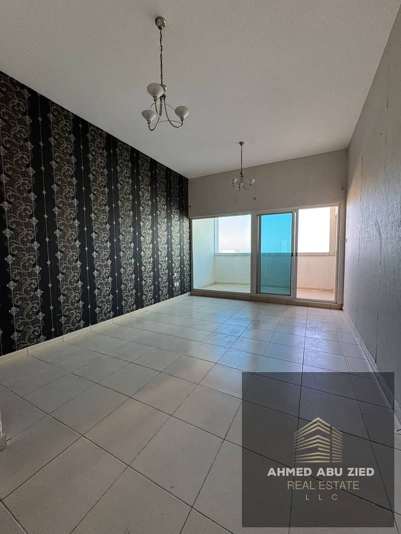 One bedroom and hall | Annual rent | Al Rashidiya 3 | Free gym & pool | Free parking | Built-in wardrobes | Flexible payment options