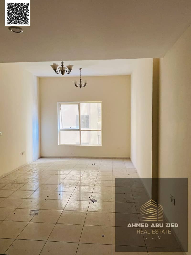 Luxury **2-bedroom apartment** with a very spacious living room, equipped kitchen, **2 bathrooms**, and a **large balcony**. Close to Sheikh Mohammed