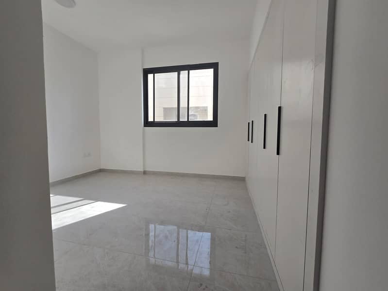 Two-bedroom apartment for annual rent in Al Hamidiya area of Ajman. The apartment consists of two bedrooms, a living room, a maid's room, three bath