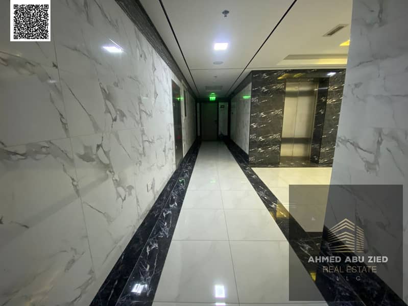 Luxury **first-tenant apartment with parking** 2 bedrooms, spacious living room, equipped kitchen, and **2 bathrooms**. Close to **Al Qabail Market