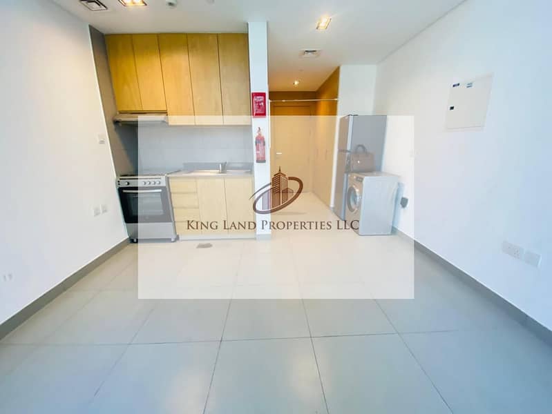 Modern Studio with Appliances | Prime Location | Al Mamsha