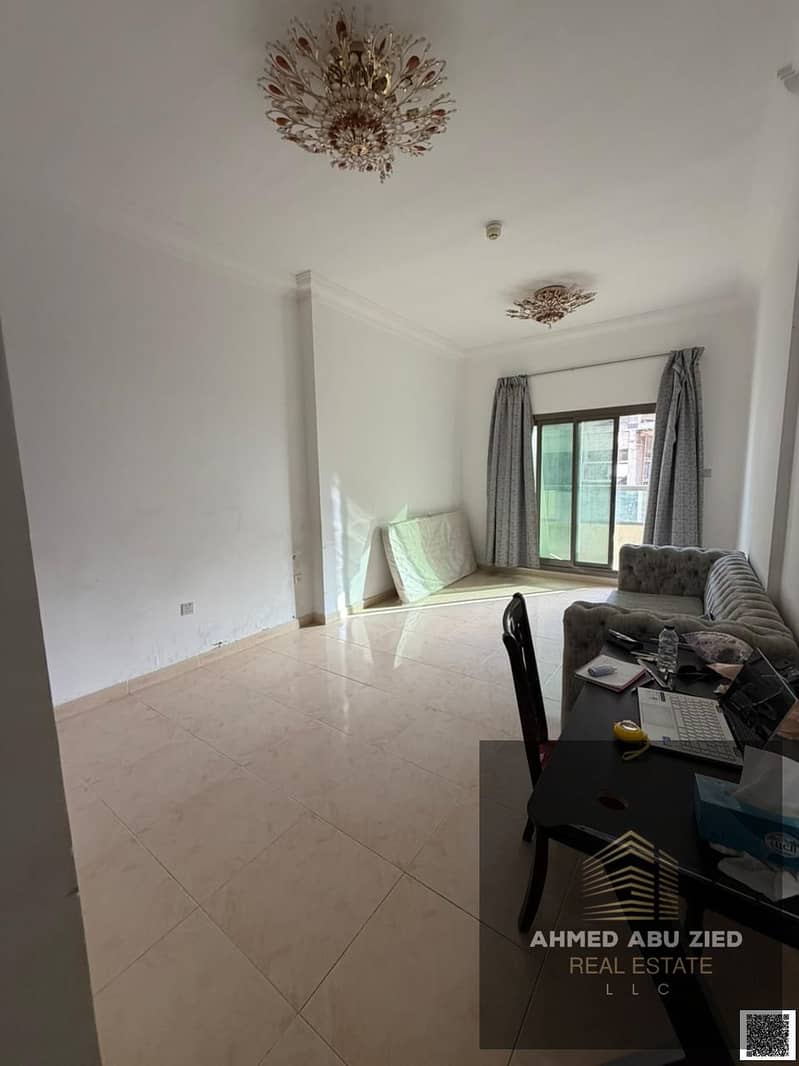 3BR apartment in Ajman, 3 baths, spacious hall, equipped kitchen, balcony, central AC, free maintenance, quiet & clean, on MBZ Road