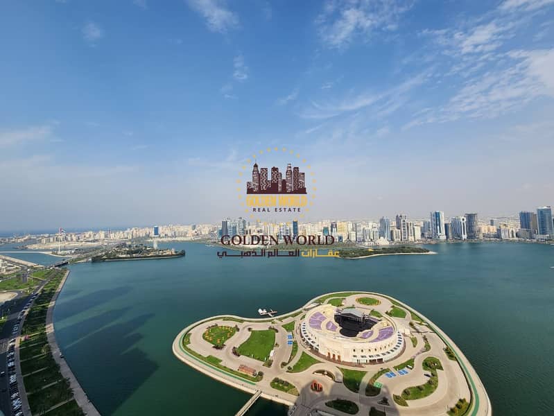 Luxury four bedroom apartment with multiple balconies in Al Majaz 3 Sharjah featuring sea view free AC maid room gym and pool premium spacious family