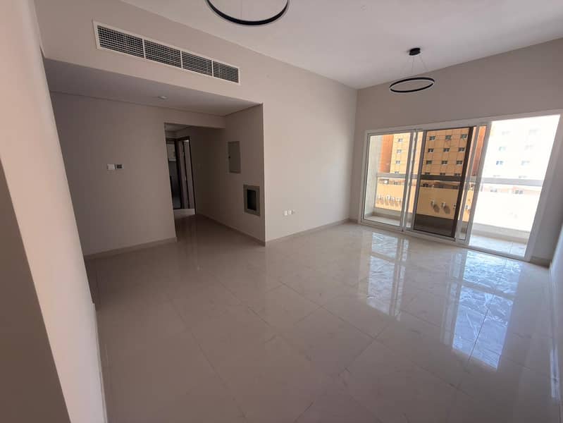 One bedroom and living room - annual rent - Al Jurf 3, Ajman - central air conditioning - maintenance included - first occupant - new building