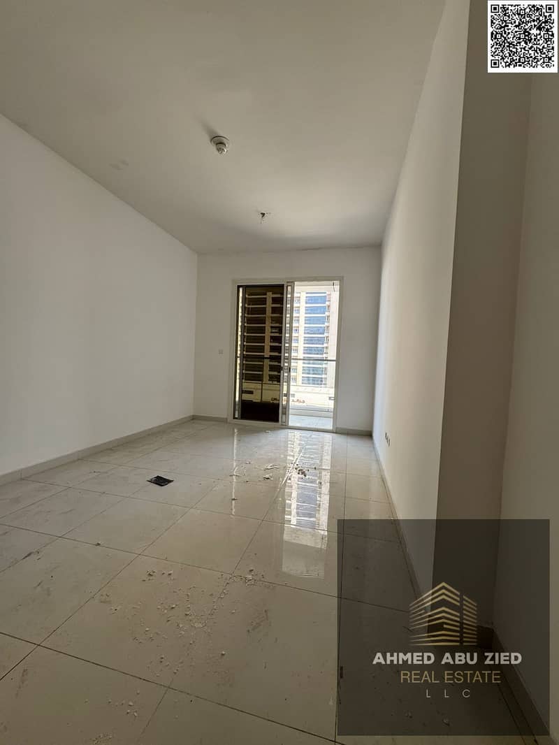Largest 2BR in Al Rashidiya 3, annual rent. Master rooms, spacious hall, large fitted kitchen, wardrobes, 2 balconies, private parking.
