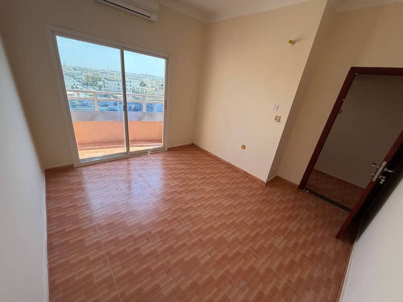 One-bedroom apartment in Rawda 1, next to Sheikh Ammar Street, with a balcony, a distinctive view, two bathrooms, and split air conditioning, priced a