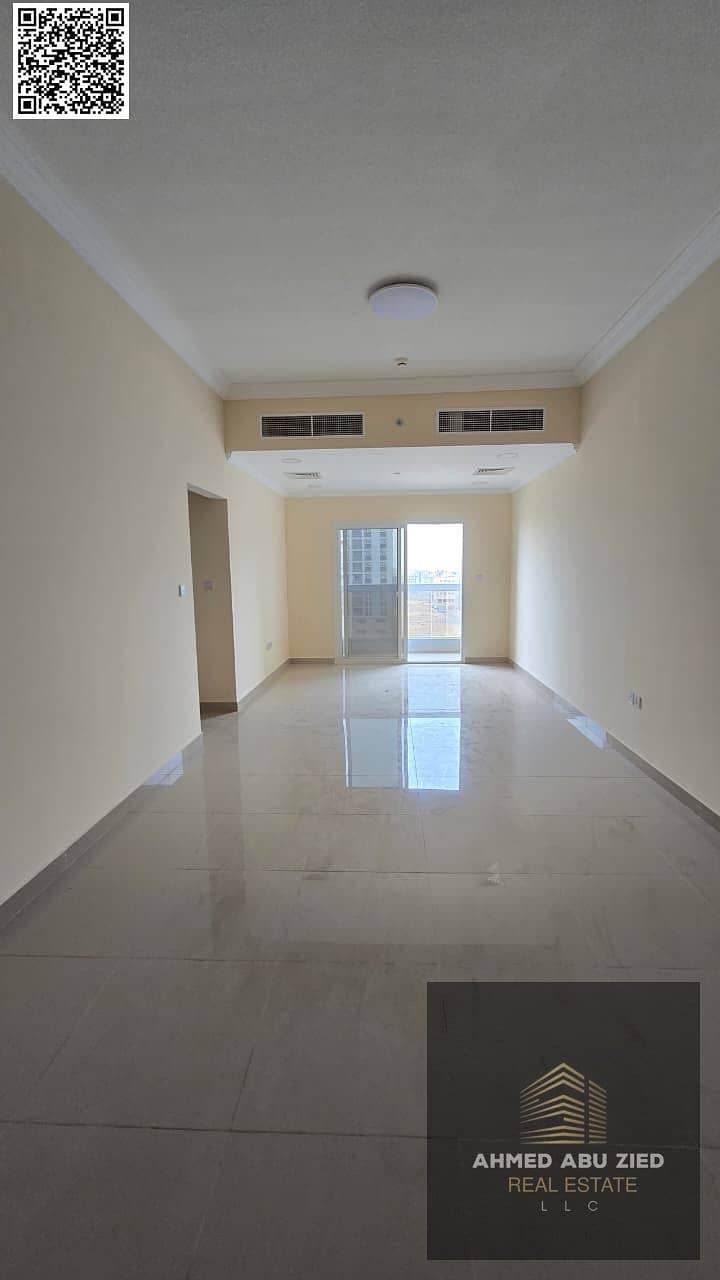Two-bedroom apartment with a living room and balcony, brand new for annual rent in Al Jurf 3, Ajman – with a storage room and modern finishing, close