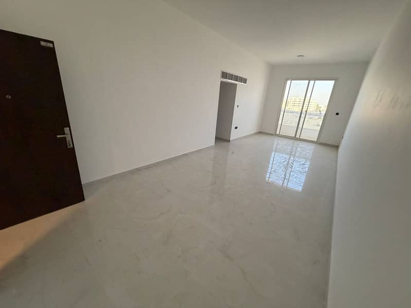 Beautiful apartments for annual rent in Al Rawda 3, Ajman, in a brand new building, first occupancy, with high-end finishes and a modern design to sui