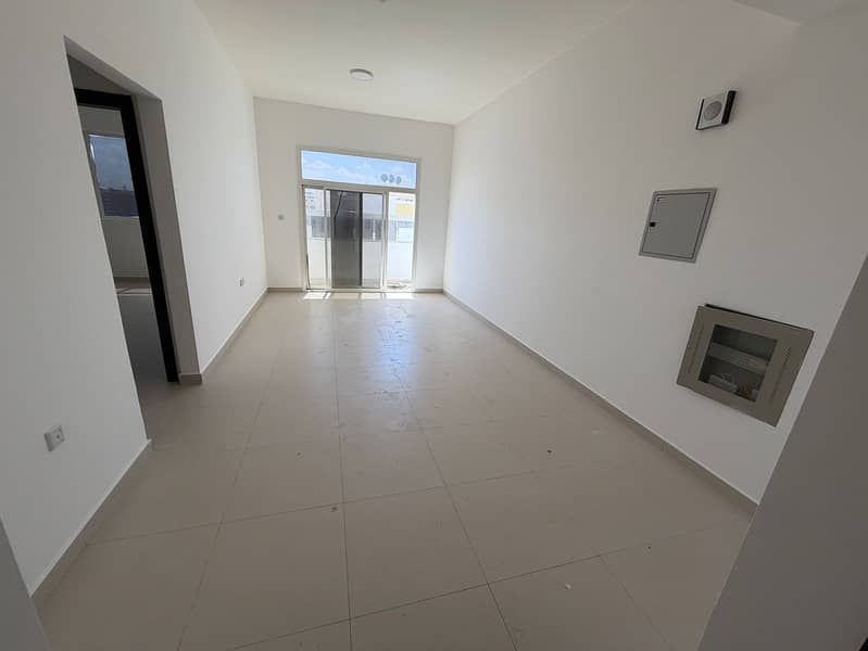 The most beautiful apartments for annual rent in Al Muwaihat 3, Ajman. This one-bedroom apartment boasts a prime location directly on the main road,