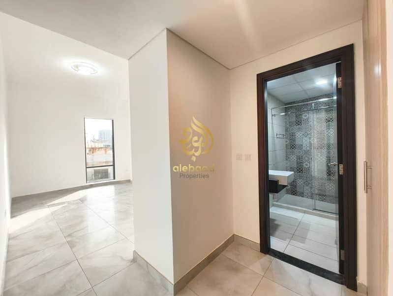 2 Bedroom Apartment | White Rose Building JVC | Balcony & City View - Image 8