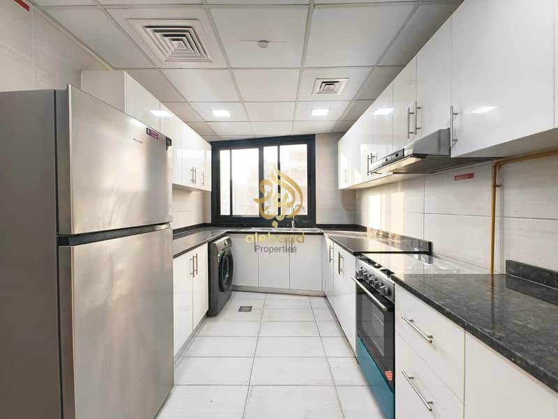 2 Bedroom Apartment | White Rose Building JVC | Balcony & City View - Image 13